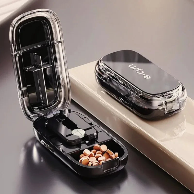Coupe-comprimés portable 4-en-1 avec pilulier, broyeur et compartiment de rangement étanche à la poussière